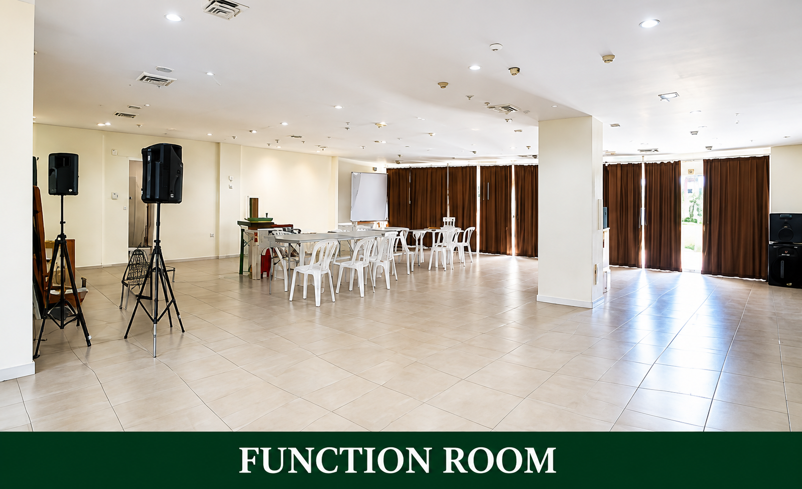 Amaia Steps Sucat Function Room interior, tables and chairs set up for an event